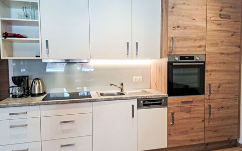 Josephine: Cabinetry, Countertop, Flooring, Kitchen Appliance, Furniture, Kitchen, Wood, Interior Design, Major Appliance, Cupboard