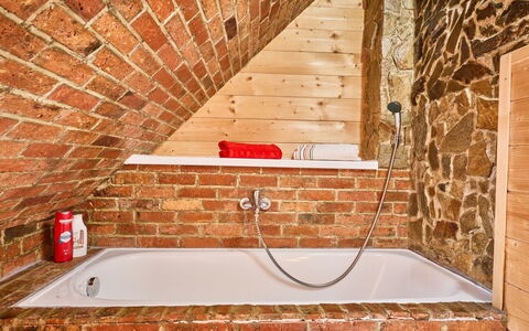 Roubenka U Potoka: Plumbing Fixture, Flooring, Plumbing, Floor, Bathtub, Attic, Bathroom, Tap, Wood Stain