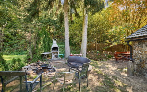 Roubenka U Potoka: Furniture, Shrub, Garden, Outdoor Furniture, Chair, Backyard, Outdoor Table, Shade, Cottage, Landscaping