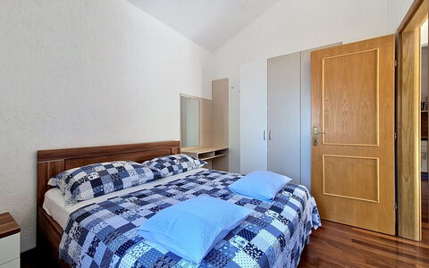 Blue: Bed, Interior Design, Bedroom, Floor, Flooring, Wood, Furniture, Ceiling, Room, Bed Sheet