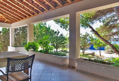 Blue: Floor, Ceiling, Flooring, Furniture, Chair, Shade, Resort, Outdoor Furniture, Eco Hotel, Garden