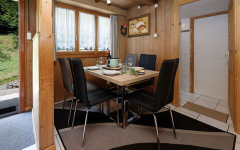 Haus Margrittli: Furniture, Interior Design, Wood, Flooring, Ceiling, Room, Floor, Lighting, Table, Kitchen