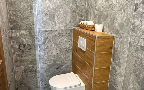 Vilém: Flooring, Floor, Tile, Plumbing Fixture, Plumbing, Bathroom, Marble, Natural Material, Bathroom Cabinet