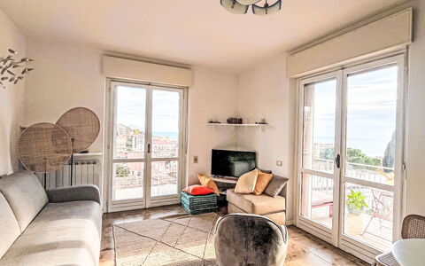 Sirio Vista Blu Apartment: Furniture, Interior Design, Flooring, Chair, Floor, Table, Room, Apartment, Ceiling, Living Room
