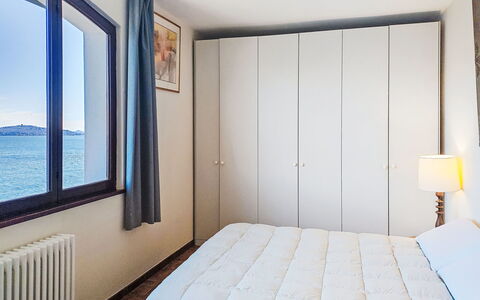 Leonard Lake: Bedroom, Bed, Furniture, Bed Sheet, Interior Design, Bedding, Room, Floor, Linens, Bed Frame