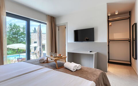 La Mari: Furniture, Apartment, Chair, Bedroom, Outdoor Furniture, Shade, Design, Resort, Bed, Bed Frame