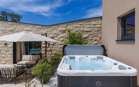 La Mari: Plumbing Fixture, Bathtub, Furniture, Swimming Pool, Resort, Outdoor Furniture, Jacuzzi, Chair, Houseplant