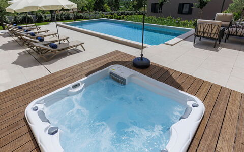 Sola: Swimming Pool, Leisure, Plumbing Fixture, Bathtub, Composite Material, Jacuzzi, Resort, Vacation, Outdoor Furniture