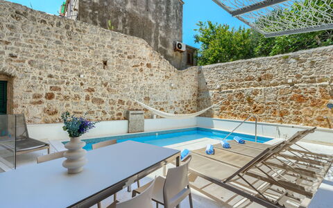 Villa Majestic: Swimming Pool, Resort, Tile, Stone Wall, Resort Town, Outdoor Furniture, Limestone, Hotel