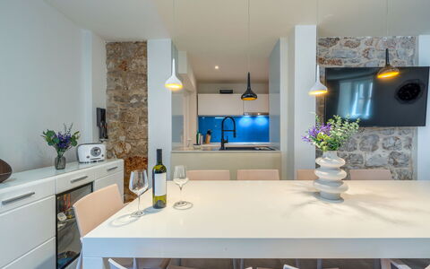 Villa Majestic: Furniture, Interior Design, Kitchen, Flooring, Wall, Countertop, Light Fixture, Ceiling, Wood, Floor