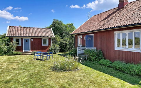Villa Alvaret: Grass, Building, House, Roof, Home, Shrub, Cottage, Residential Area, Architecture