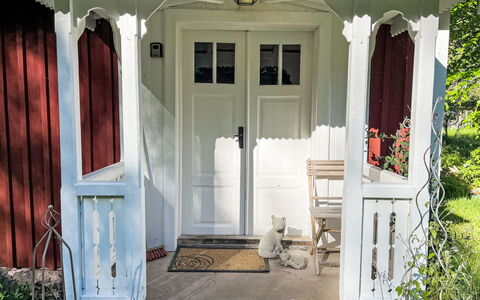 Kråktorpet: Wood, Door, Porch, Home Door, Siding, Outdoor Structure, Hardwood, Column, Wood Stain, Garden Buildings