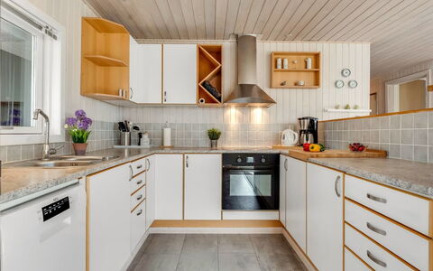 Danail - 250M from the Sea: Kitchen, Countertop, Wood, Flooring, Kitchen Appliance, Interior Design, Major Appliance, Cabinetry, Ceiling, Floor