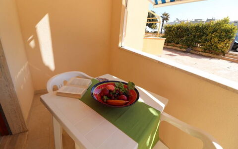 Alice: Furniture, Chair, Outdoor Furniture, Wood Stain, Shade, Outdoor Table, Kitchen & Dining Room Table, Balcony, Coffee Table
