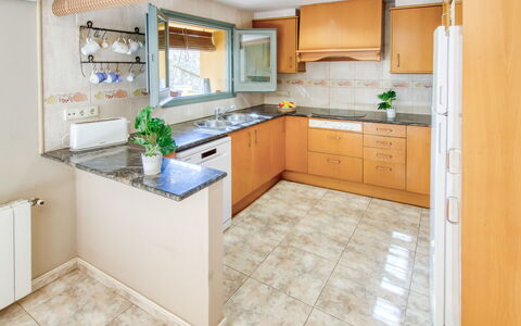 Ca L'Andreu: Kitchen, Countertop, Flooring, Cabinetry, Interior Design, Kitchen Appliance, Floor, Major Appliance, Furniture, Sink