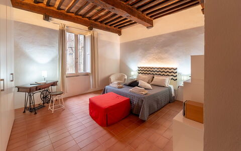 Le Loggine del Pignatello Apartment, Siena City: Wall, Bedroom, Interior Design, Bed, Furniture, Flooring, Floor, Bed Sheet, Ceiling, Bedding