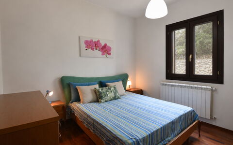 Villa Margi: Bed, Furniture, Interior Design, Bedding, Bedroom, Bed Sheet, Wall, Room, Wood, Floor
