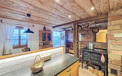 Mirnock-Chalet: Wood, Ceiling, Kitchen, Interior Design, Flooring, Countertop, Light Fixture, Floor, Room, Furniture