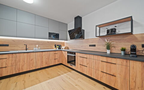 Na Kovárně: Countertop, Cabinetry, Flooring, Kitchen, Wood, Interior Design, Furniture, Floor, Wood Flooring, Kitchen Appliance