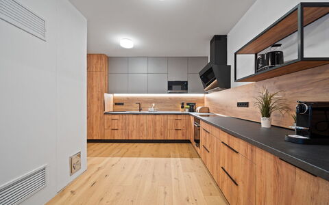 Na Kovárně: Countertop, Kitchen, Flooring, Wood, Interior Design, Cabinetry, Furniture, Floor, Ceiling, Wood Flooring