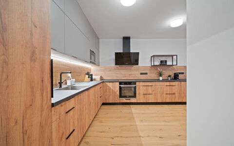 Na Kovárně: Countertop, Kitchen, Flooring, Interior Design, Cabinetry, Wood, Furniture, Floor, Kitchen Appliance, Ceiling