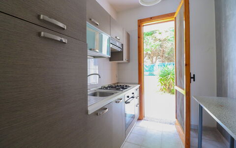 Amanda: Kitchen, Kitchen Sink, Wood, Countertop, Kitchen Appliance, Major Appliance, Flooring, Home, Floor, Interior Design