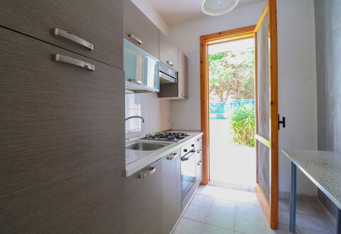 Amanda: Kitchen, Kitchen Sink, Wood, Countertop, Kitchen Appliance, Major Appliance, Flooring, Home, Floor, Interior Design
