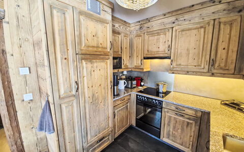 Manila 7: Wood, Cabinetry, Kitchen, Countertop, Wood Stain, Drawer, Cupboard, Hardwood, Kitchen Appliance, Plywood