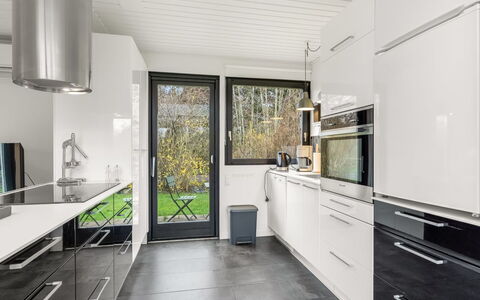 Arild - 700M from the Sea: Kitchen, Countertop, Flooring, Wood, Kitchen Appliance, Interior Design, Major Appliance, Cabinetry, Floor, Home