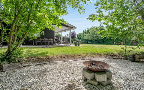 Arild - 700M from the Sea: Shrub, Garden, Groundcover, Shade, Landscaping, Lawn, Backyard, Cottage, Yard, Driveway