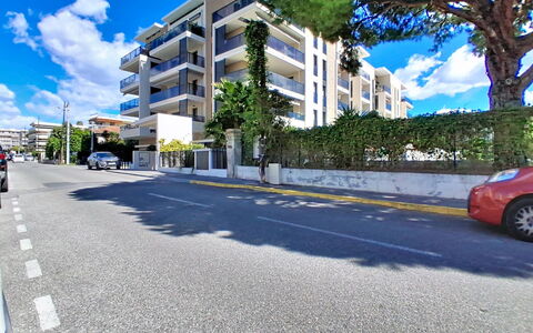 Blue Wave: Building, City, Residential Area, Urban Area, Apartment, Road, Neighbourhood, Town, Street, Asphalt