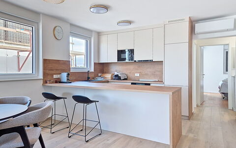 Lidija: Furniture, Interior Design, Countertop, Flooring, Kitchen, Floor, Light Fixture, Cabinetry, Wall, Wood