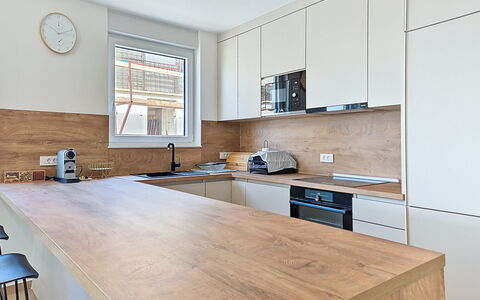 Lidija: Countertop, Furniture, Cabinetry, Kitchen, Interior Design, Flooring, Floor, Kitchen Appliance, Wood, Home