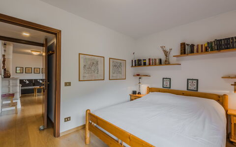 Ginepro: Furniture, Interior Design, Bed, Flooring, Wall, Floor, Bedroom, Wood, Room, Ceiling