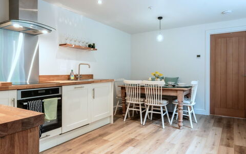 Alpine Cottage: Furniture, Interior Design, Flooring, Floor, Cabinetry, Wood Flooring, Wood, Kitchen Appliance, Countertop, Kitchen