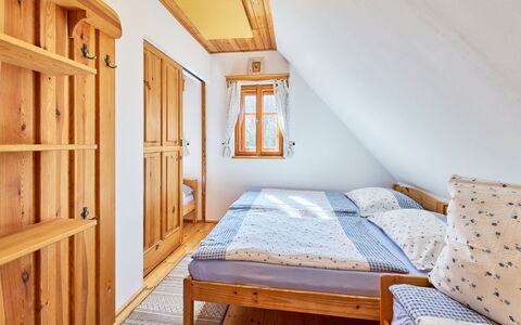 Timber Lodge with Sauna: Wood, Interior Design, Bedroom, Home, Floor, Flooring, Bed, House, Ceiling, Furniture