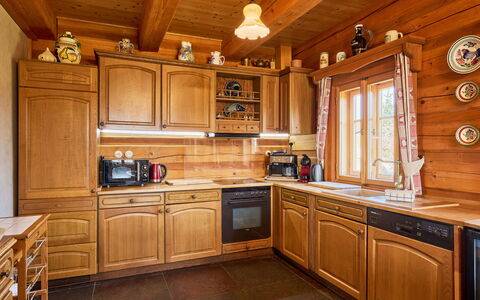 Timber Lodge with Hydromassage: Wood, Kitchen, Cabinetry, Interior Design, Furniture, Flooring, Wood Stain, Cupboard, Home, Floor