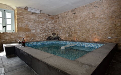 Villa Fontanazza: Bathtub, Flooring, Swimming Pool, Plumbing Fixture, Floor, Composite Material, Jacuzzi, Tile, Resort