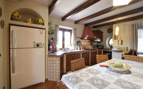 Villa Ina: Furniture, Interior Design, Wall, Flooring, Wood, Ceiling, Kitchen, Room, Chair, Kitchen & Dining Room Table