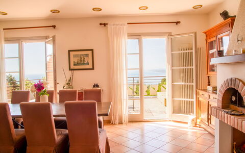 Villa Sole - Exclusive Villa al Conero con Piscina: Furniture, Chair, Table, Interior Design, Flooring, Wood, Kitchen & Dining Room Table, Floor, Lighting, Dining Room