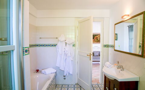 Villa Sole - Exclusive Villa al Conero con Piscina: Flooring, Interior Design, Floor, Plumbing Fixture, Lighting, Bathroom, Tap, Furniture, Ceiling, Plumbing