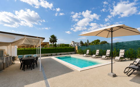 Villa Cosentini: Swimming Pool, Outdoor Furniture, Resort, Umbrella, Furniture, Composite Material, Eco Hotel, Sunlounger, Shade, Chair
