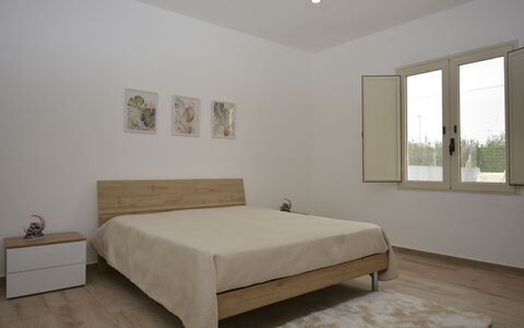 Villa Cosentini: Furniture, Bed, Bedroom, Flooring, Floor, Interior Design, Wall, Wood, Bed Sheet, Bedding