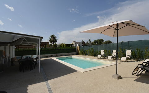 Villa Cosentini: Swimming Pool, Umbrella, Outdoor Furniture, Resort, Composite Material, Shade, Chair, Sunlounger, Eco Hotel, Leisure