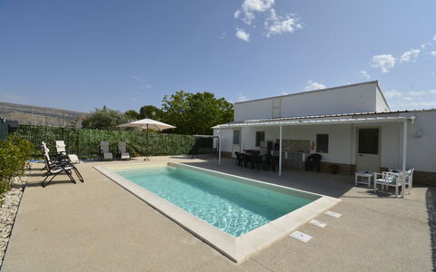 Villa Cosentini: Swimming Pool, Composite Material, Shade, Outdoor Furniture, Estate, Resort, Concrete, Chair, Courtyard, Villa