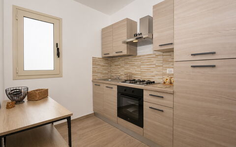 Villa Cosentini: Major Appliance, Wood, Kitchen, Countertop, Kitchen Appliance, Interior Design, Flooring, Cabinetry, Apartment, Floor