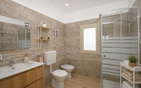 Villa Cosentini: Wall, Flooring, Floor, Plumbing Fixture, Toilet Seat, Bathroom, Toilet, Sink, Interior Design, Tile