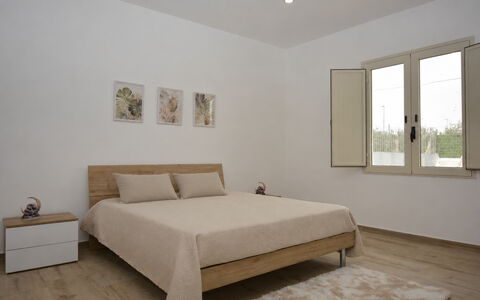 Villa Cosentini: Bed, Furniture, Bedroom, Flooring, Floor, Interior Design, Wall, Wood, Bed Sheet, Bedding