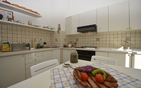 Villa del Monte: Flooring, Interior Design, Furniture, Floor, Kitchen, Countertop, Ceiling, Lighting, Room, Cabinetry