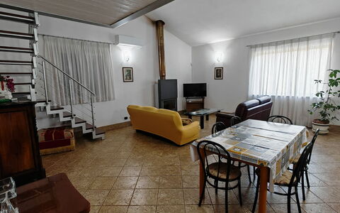 Villa del Monte: Furniture, Interior Design, Flooring, Floor, Wood, Ceiling, Room, Couch, Lighting, Living Room